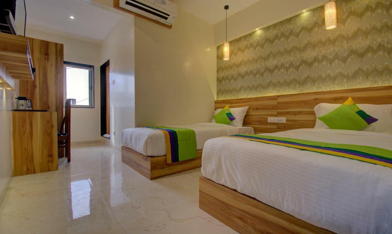 Hotel Amisha International سورات المظهر الخارجي الصورة